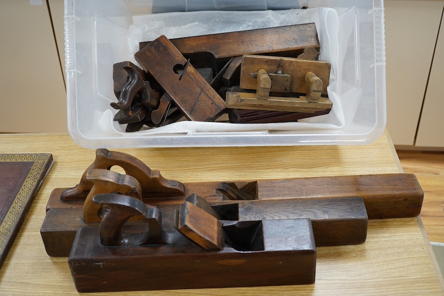 A collection of wooden carpenters tools, including various planes, two saws and a marking gauge, longest plane 73cm long. Condition - some blades missing